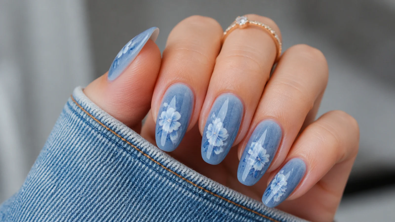 Blue blooming gel nails with a diffused denim-blue all-over wash