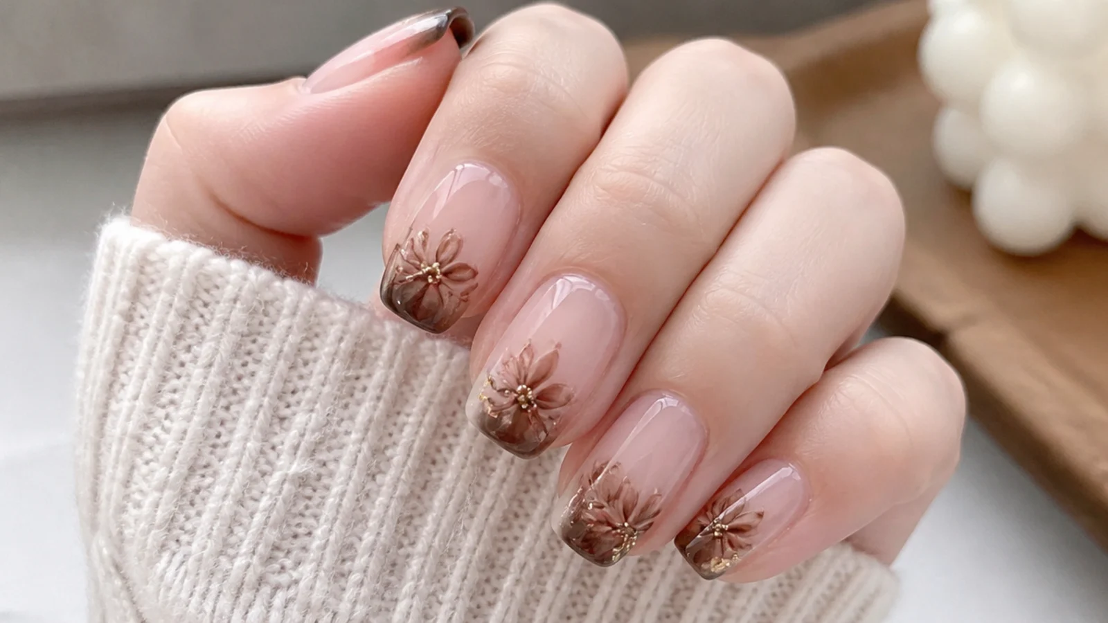 Blooming gel nails with a soft blurred chocolate brown tip