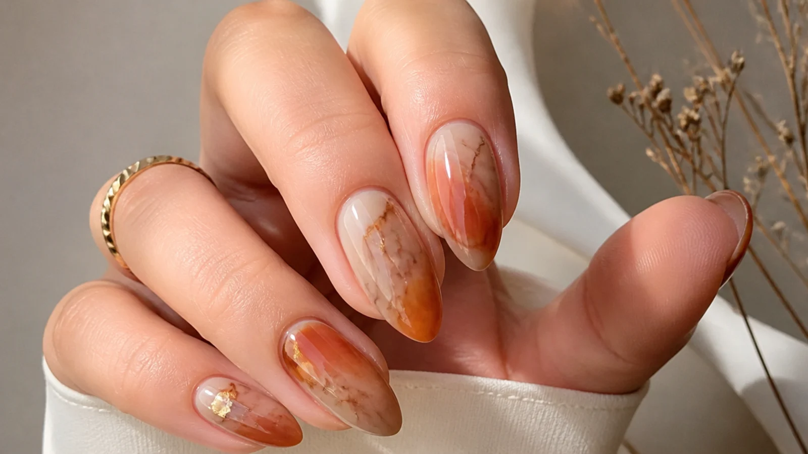 Rust orange-brown and cream marbled blooming gel nails
