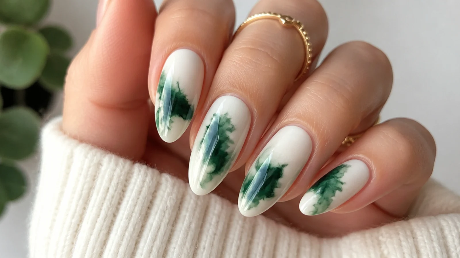 Dark forest green ink drop diffusing outward on a white base