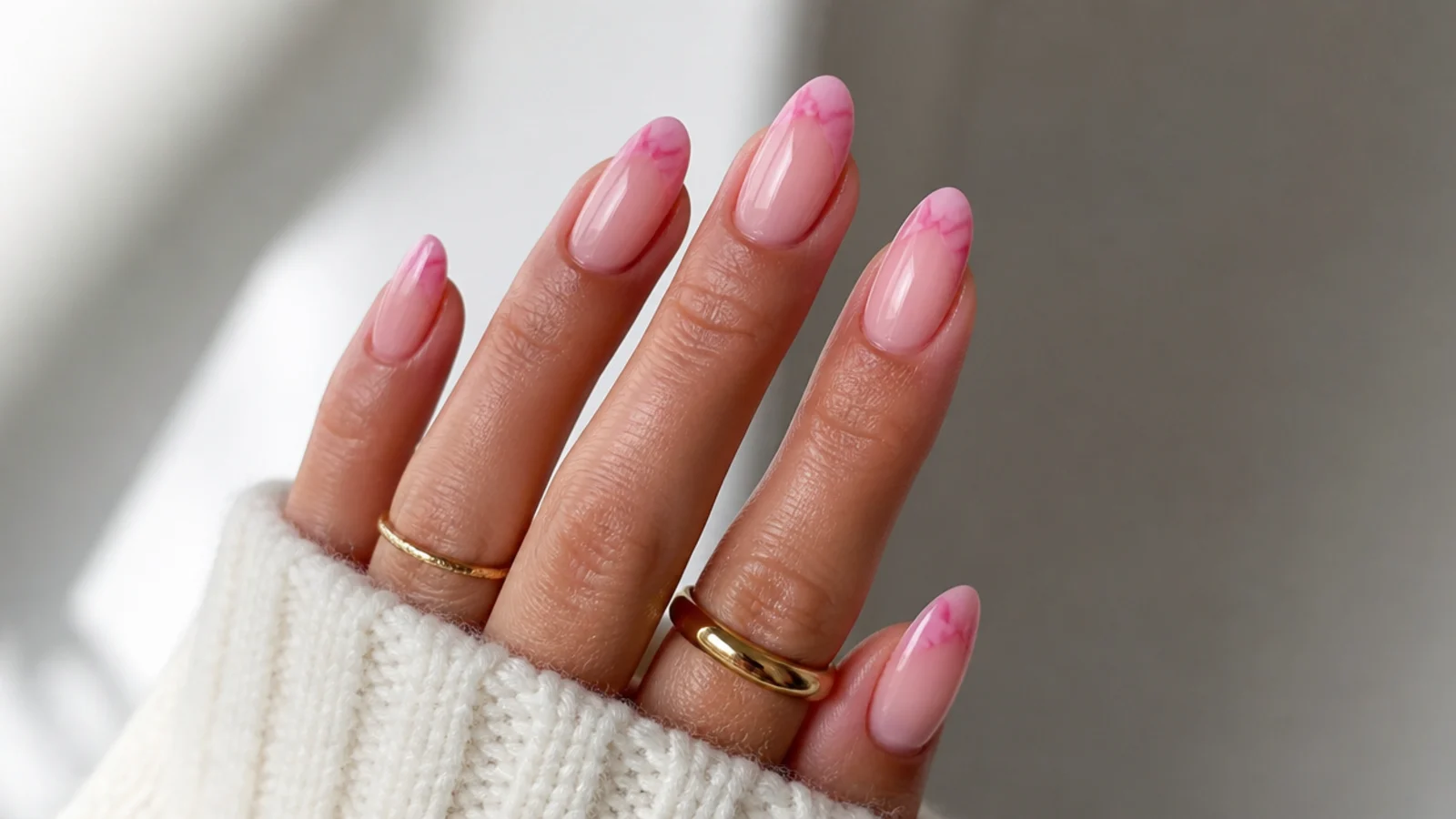 Pink blooming gel French tip nails with a soft diffused edge