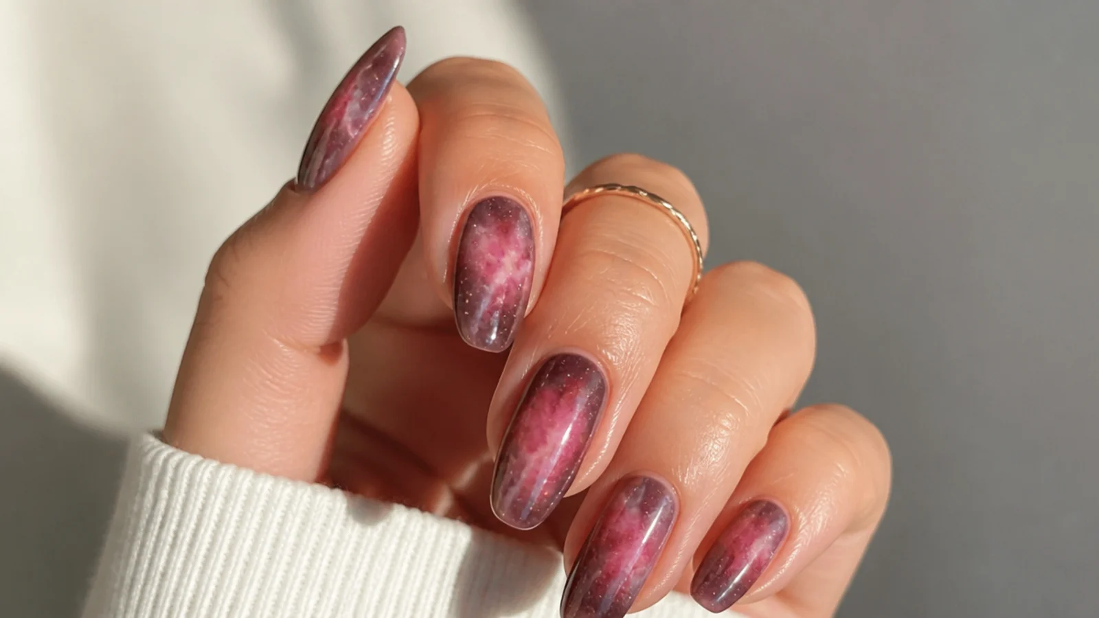 Pink and mauve galaxy diffusion blooming gel nails