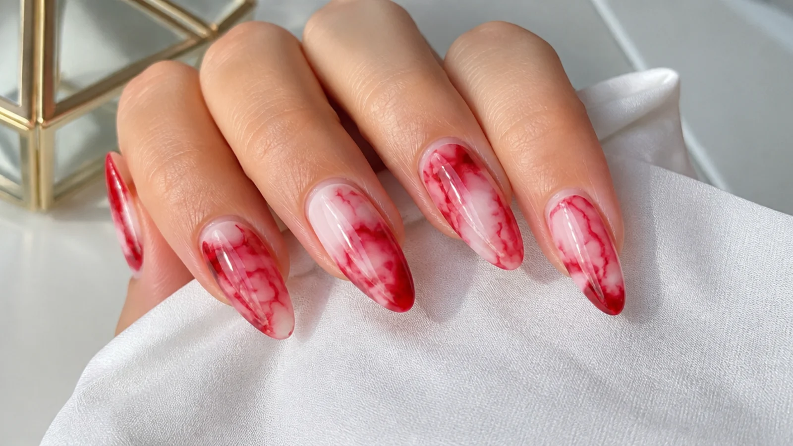 Crimson and white tie-dye blooming gel nails with soft diffused edges
