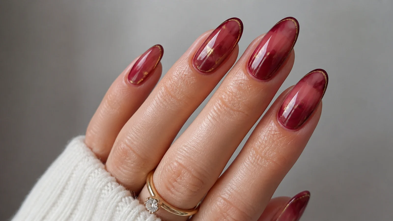 Deep wine red blooming gel nails with smoky diffused color