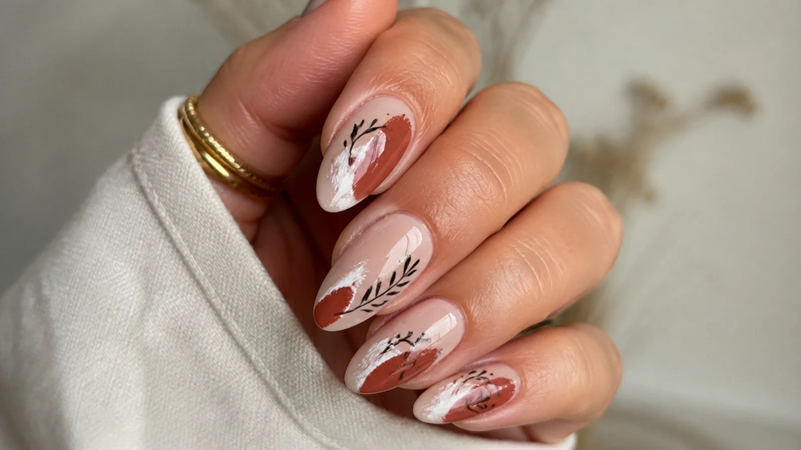Rust and cream abstract swipe boho nails on almond shapes