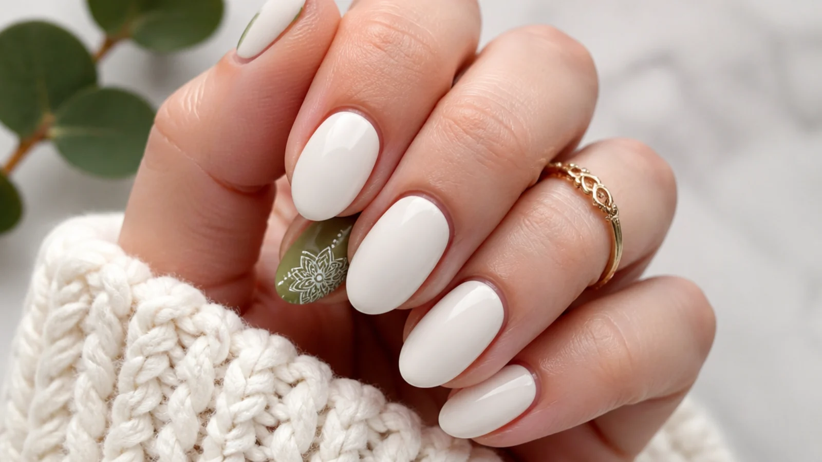 White mandala line-art motif on an olive boho accent nail