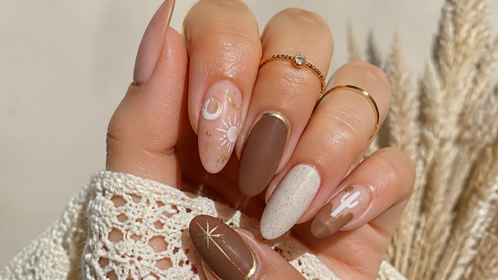 Earth-tone boho nails styled for a festival and an outdoor wedding