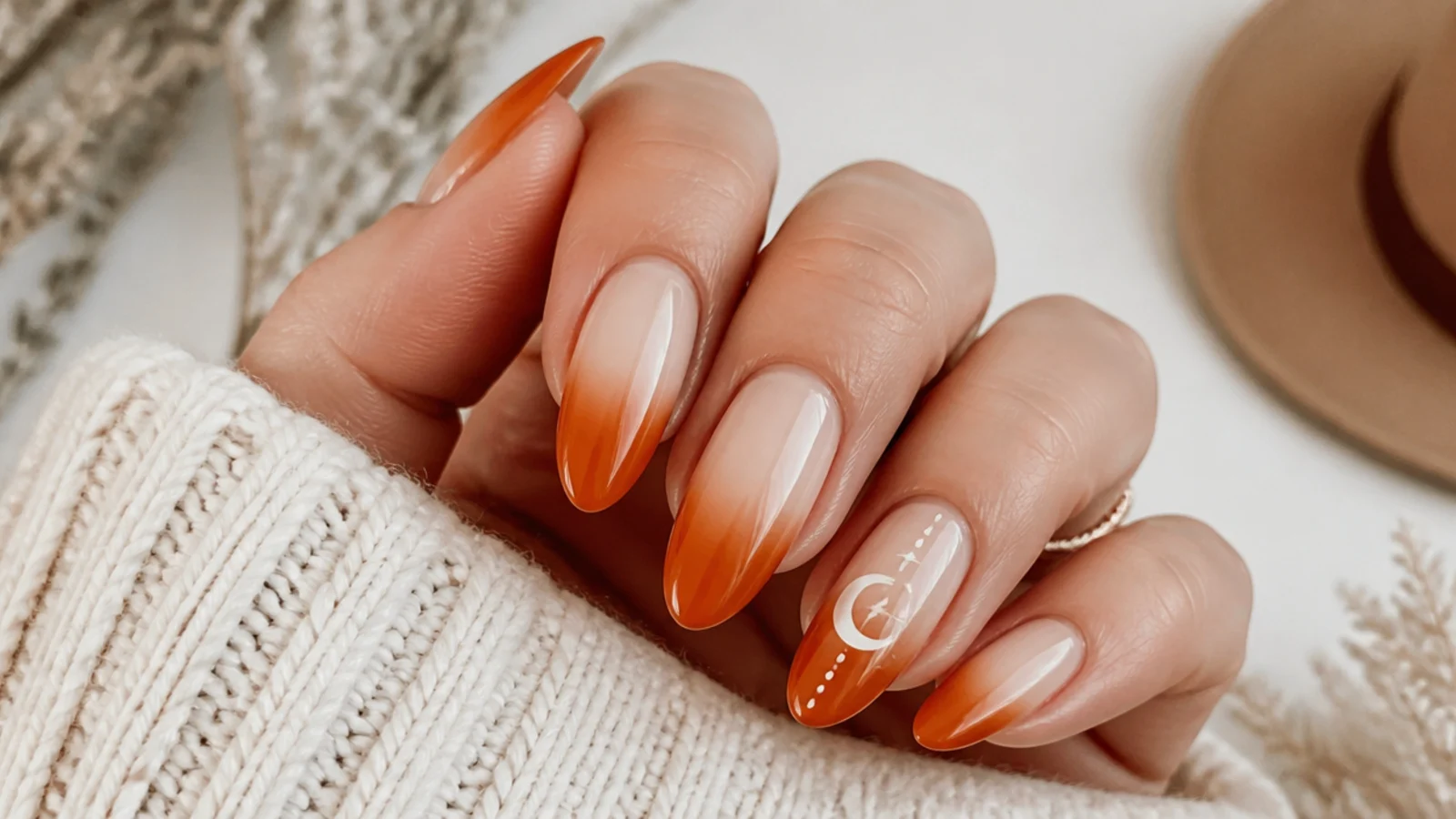 Burnt orange and cream ombre boho nails fading toward the cuticle