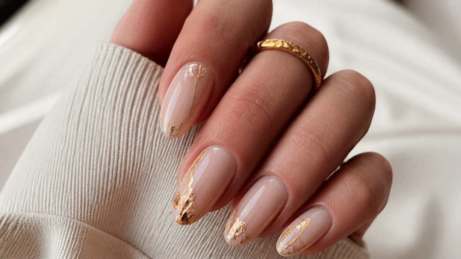 Nude boho nails with torn muted gold foil accents