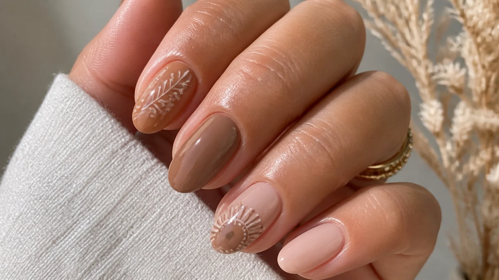 Warm tan nude boho nails on short almond nails