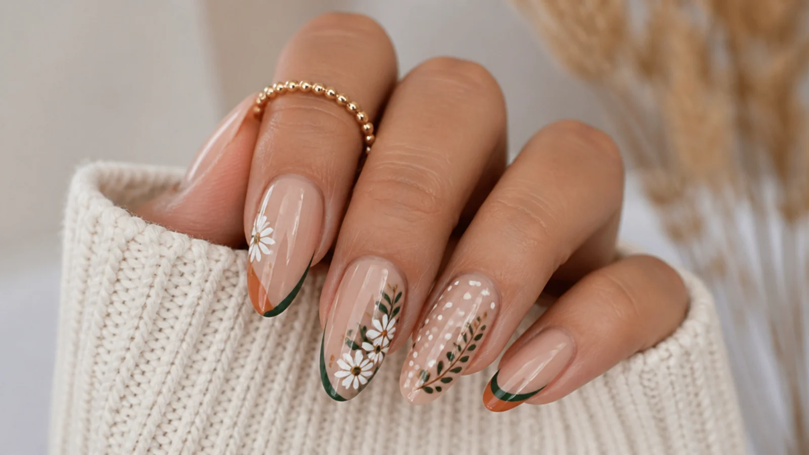 Boho spring nails styled for both a festival look and an everyday earthy look