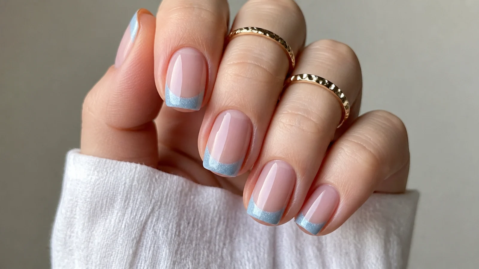 Soft powder blue cat eye french tips on short square nails
