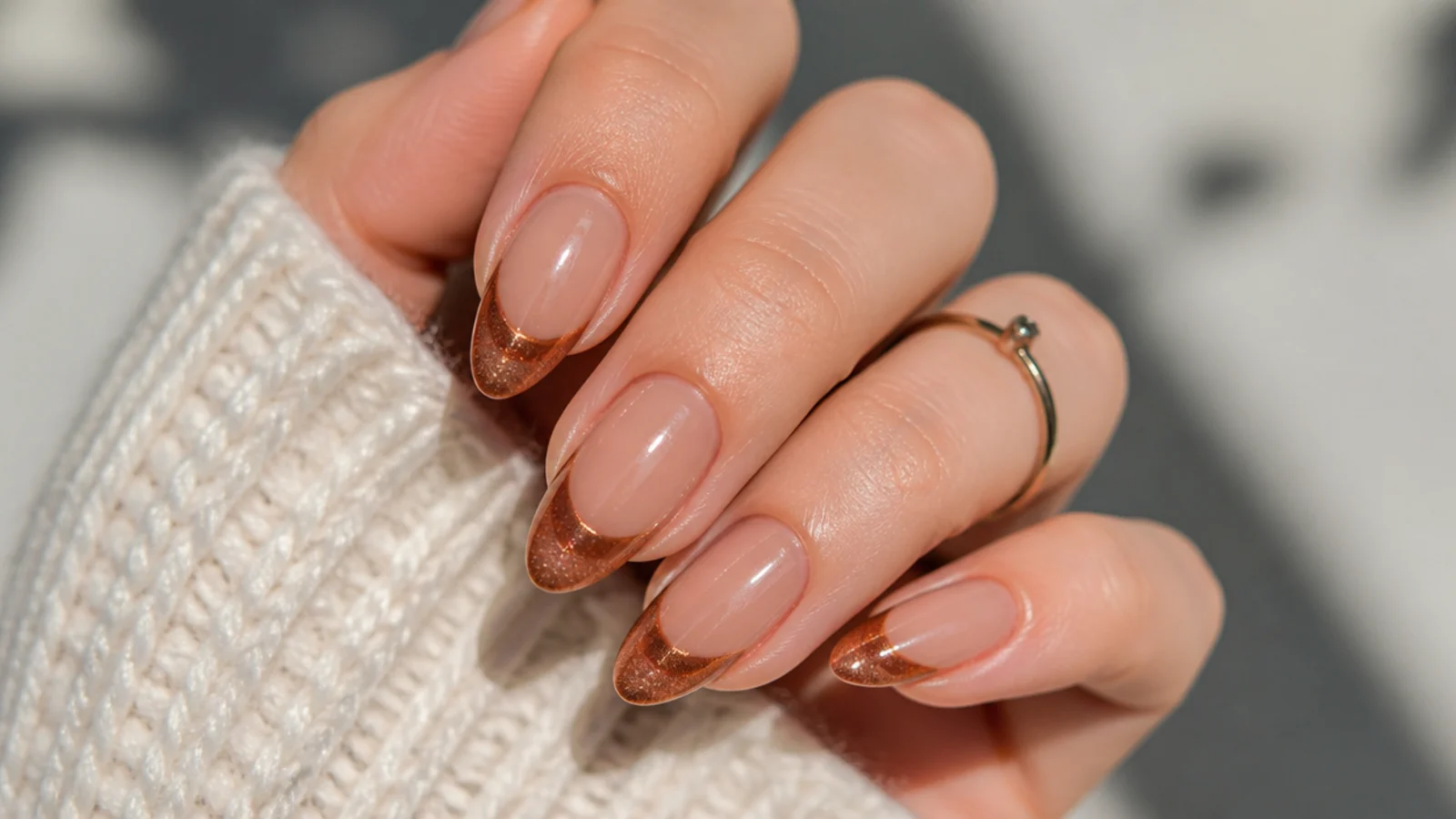 Warm cinnamon brown cat eye french tip nails for autumn