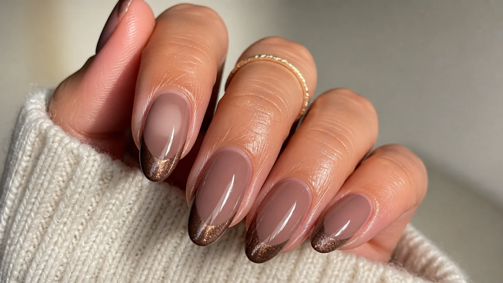 Glazed milk chocolate cat eye french tips with a pearly sheen