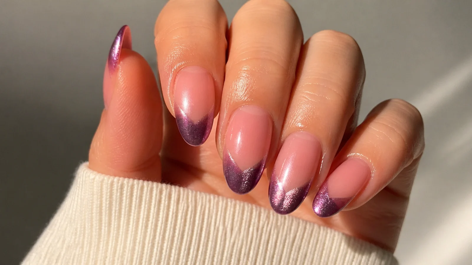 A well-sealed magnetic cat eye french tip manicure with cuticle oil for longevity