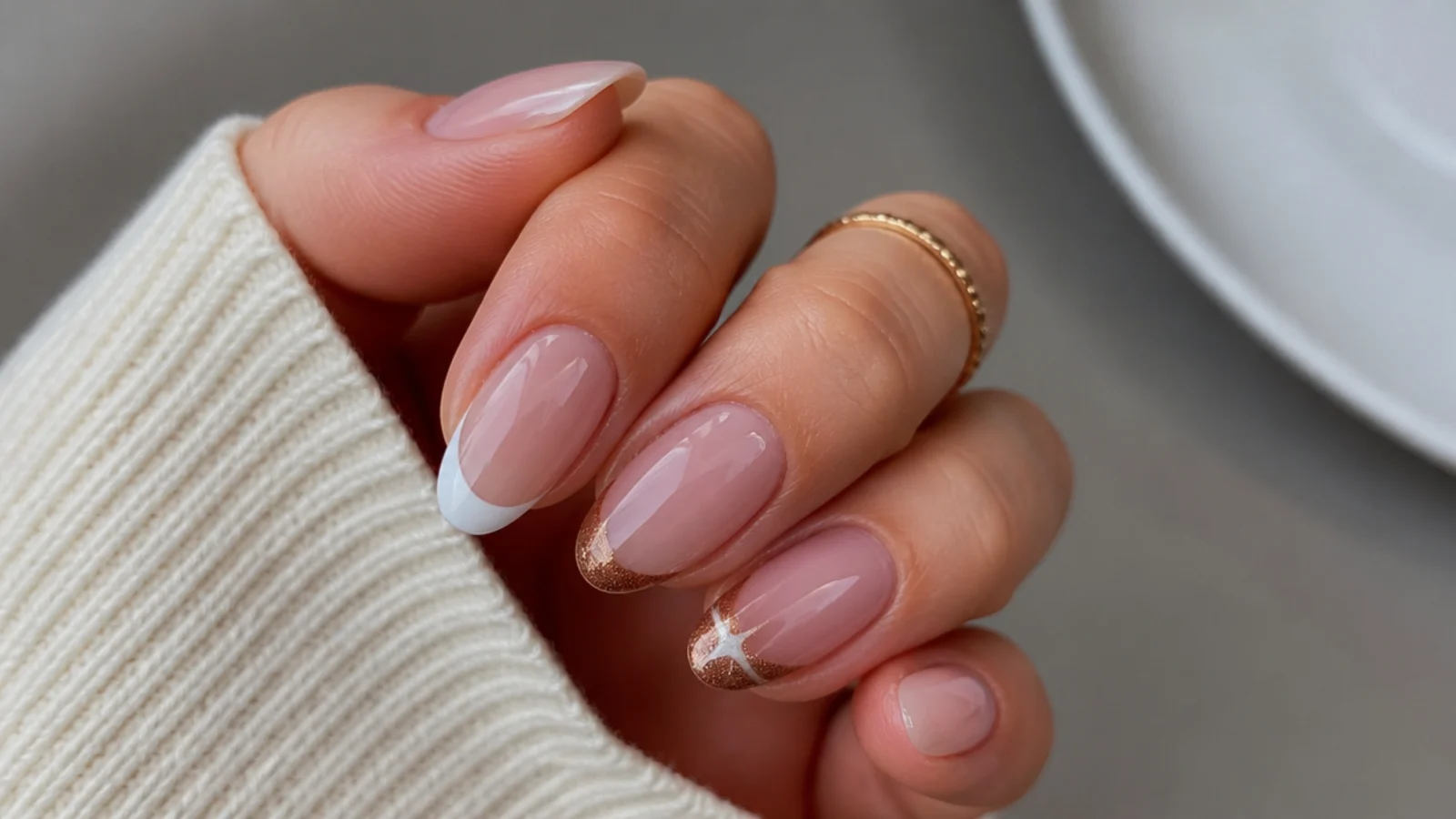 A flat white classic french tip beside a dimensional magnetic cat eye french tip