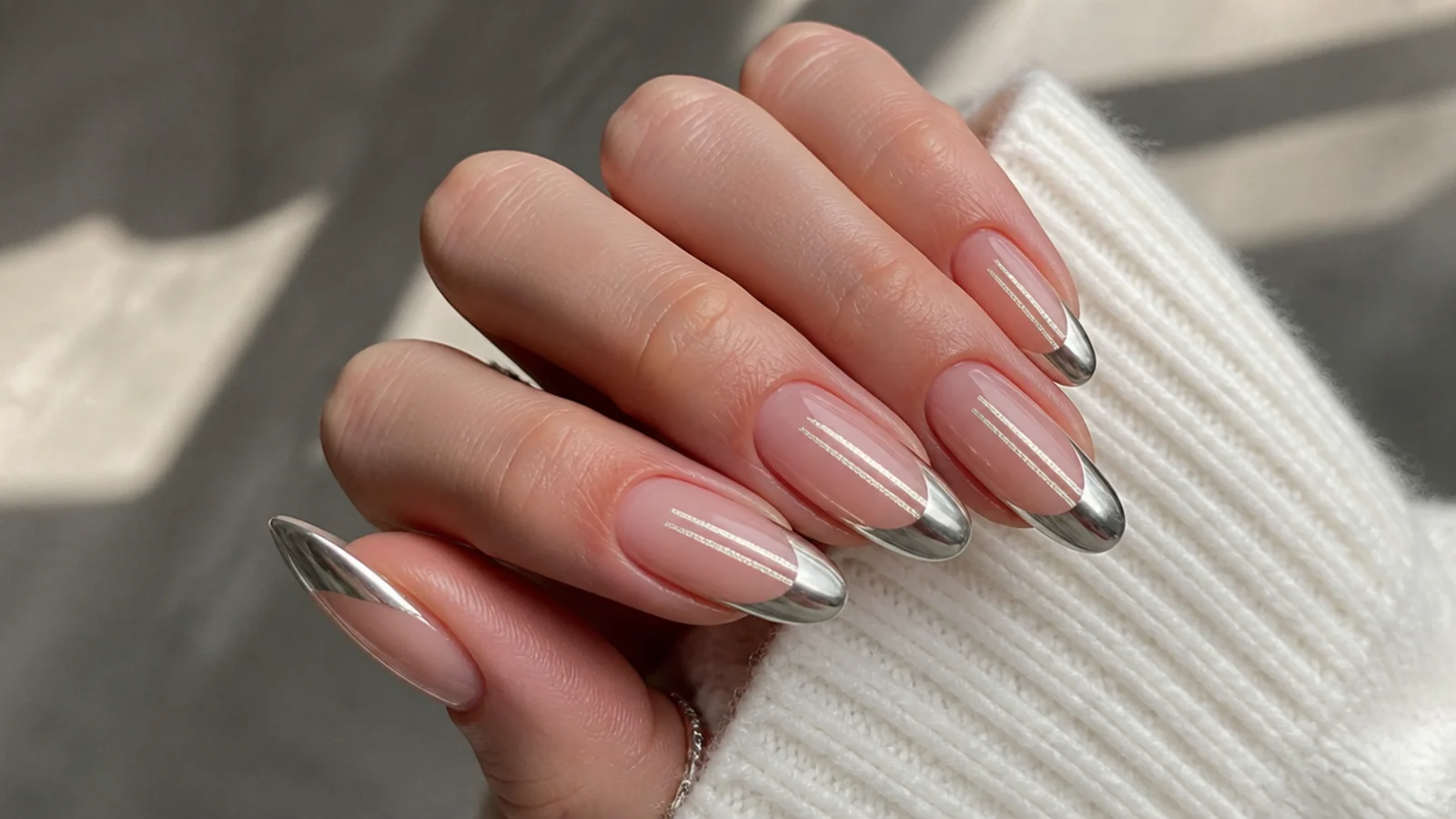 Silver chrome french tip nails with two parallel magnetic light bands