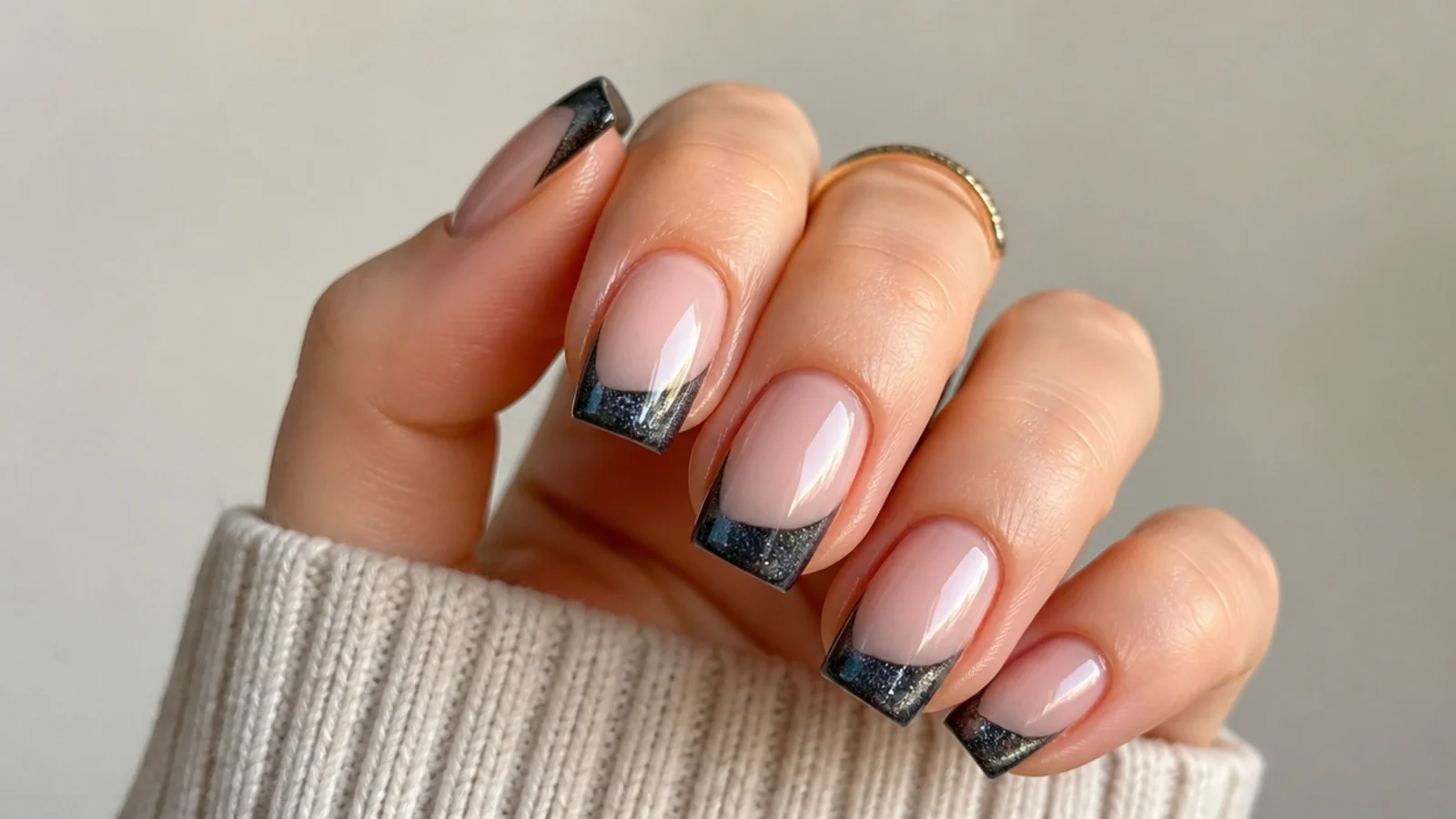 Square nails with a smoky gunmetal magnetic cat eye french tip