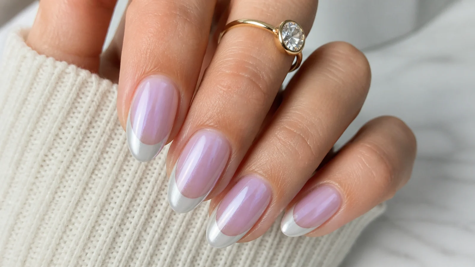 Almond nails with a lilac aura glowing from the nail bed under a crisp white chrome French tip