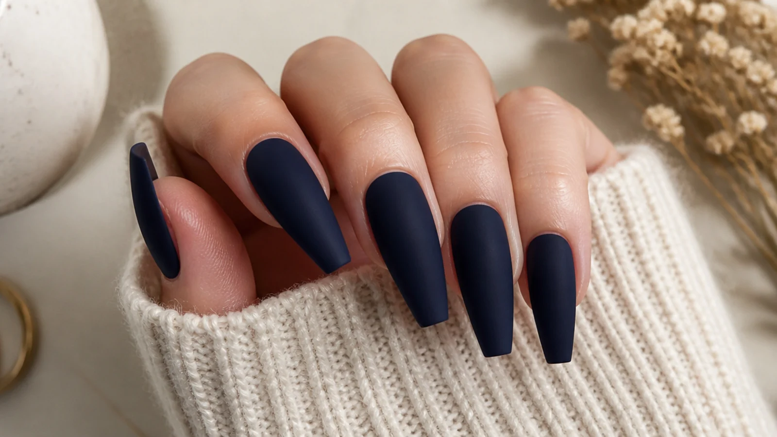 Matte navy blue coffin nails with a velvet flat finish on long tips