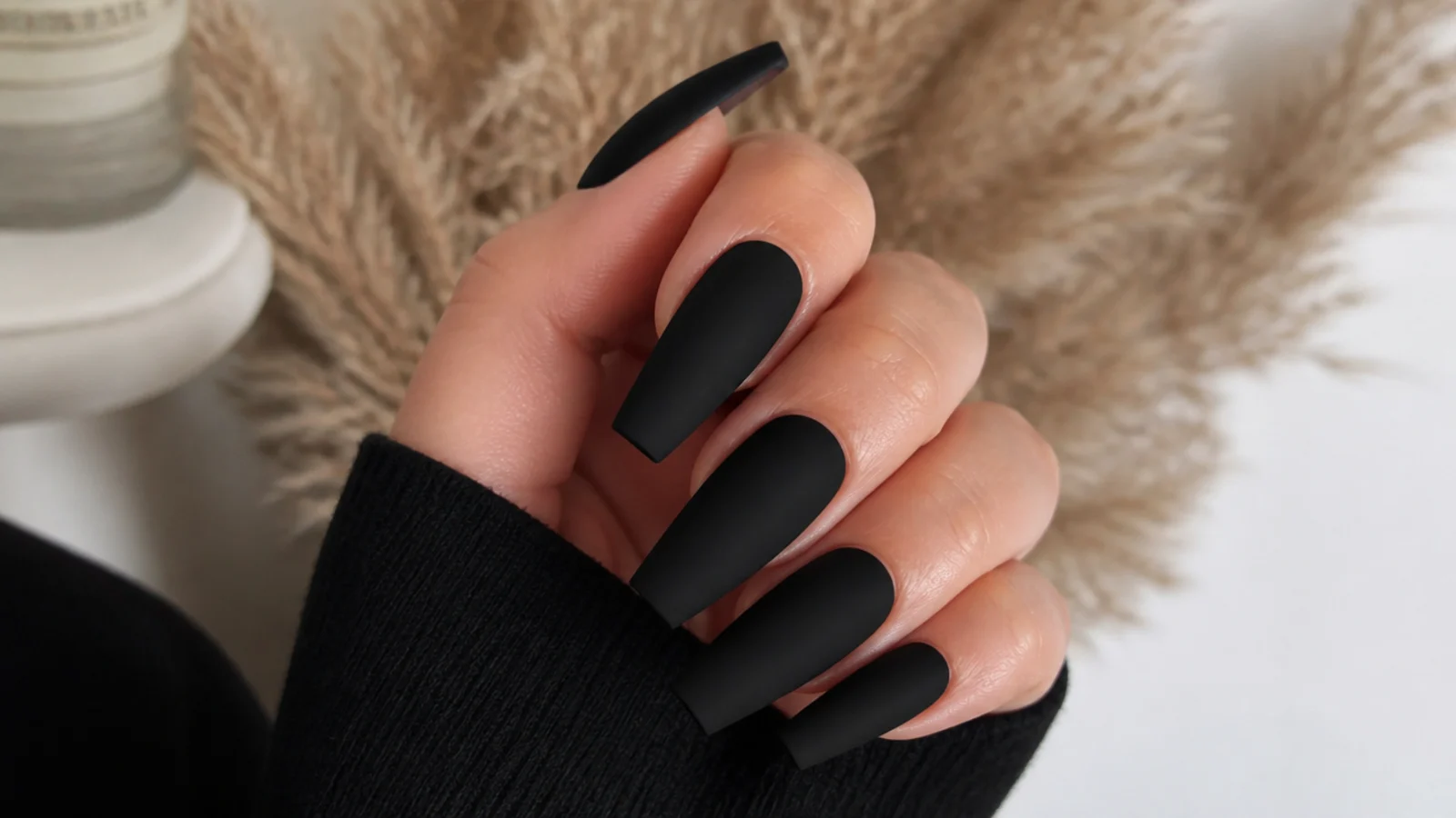 Long matte black coffin nails with sharp straight sidewalls and a flat tip