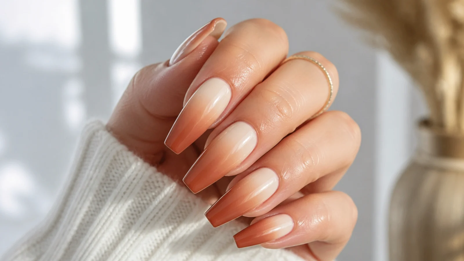 Coffin nails fading from cream at the cuticle to cinnamon brown at the tip