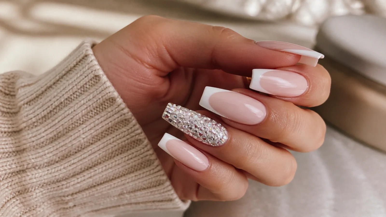 Long coffin accent nail fully covered in graduated clear crystals
