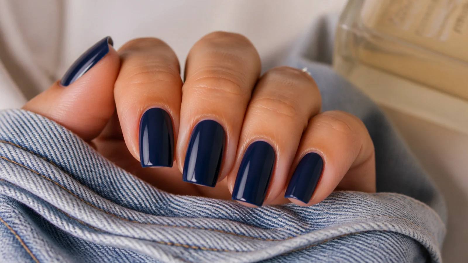 Short coffin nails in deep navy blue with crisp tapered sidewalls