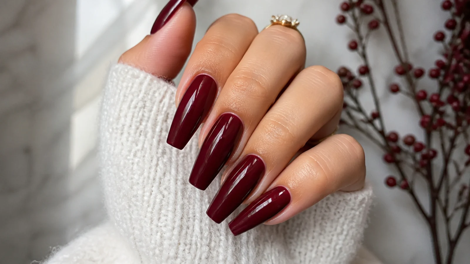 Deep berry coffin acrylic nails with a glossy finish