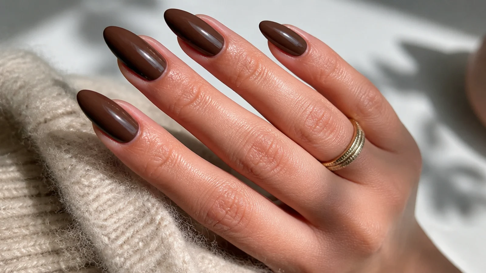Glossy chocolate brown almond acrylic nails