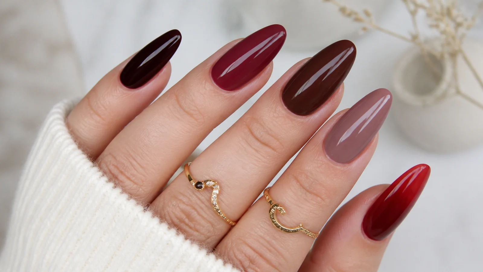Swatches of oxblood, berry, wine, chocolate, mauve and sheer red acrylic