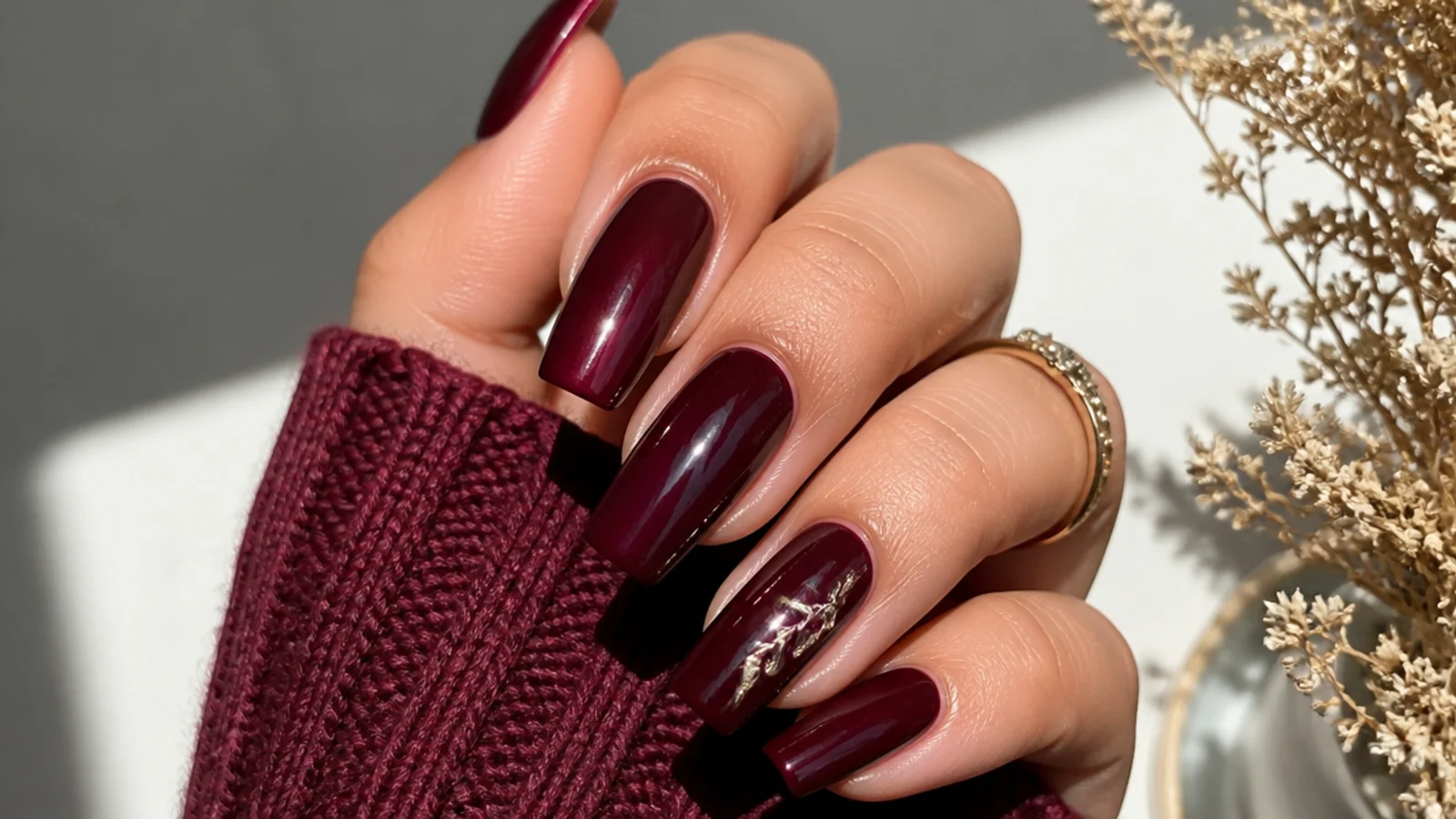 Deep berry coffin dark feminine nails with a glossy finish