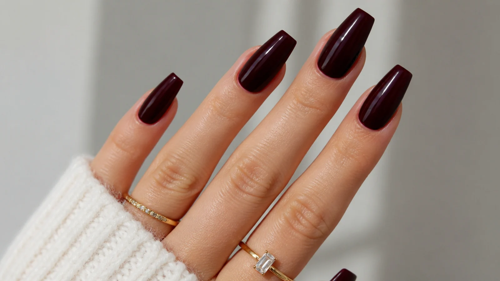 Deep black cherry coffin dark feminine nails with a glossy sheen