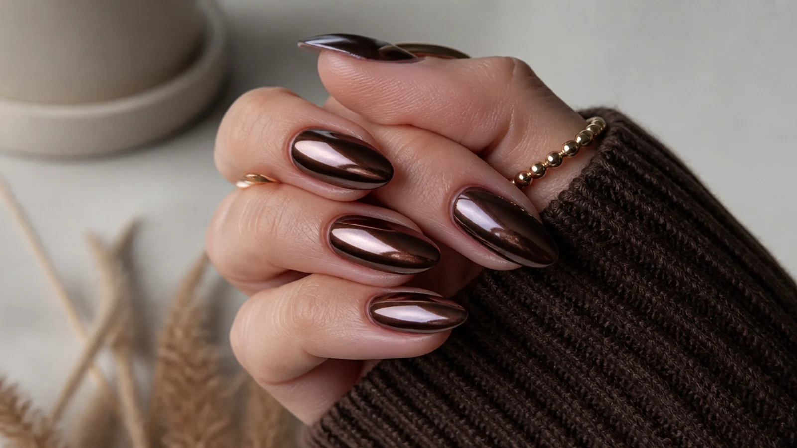 Deep espresso brown chrome almond dark feminine nails with a metallic sheen