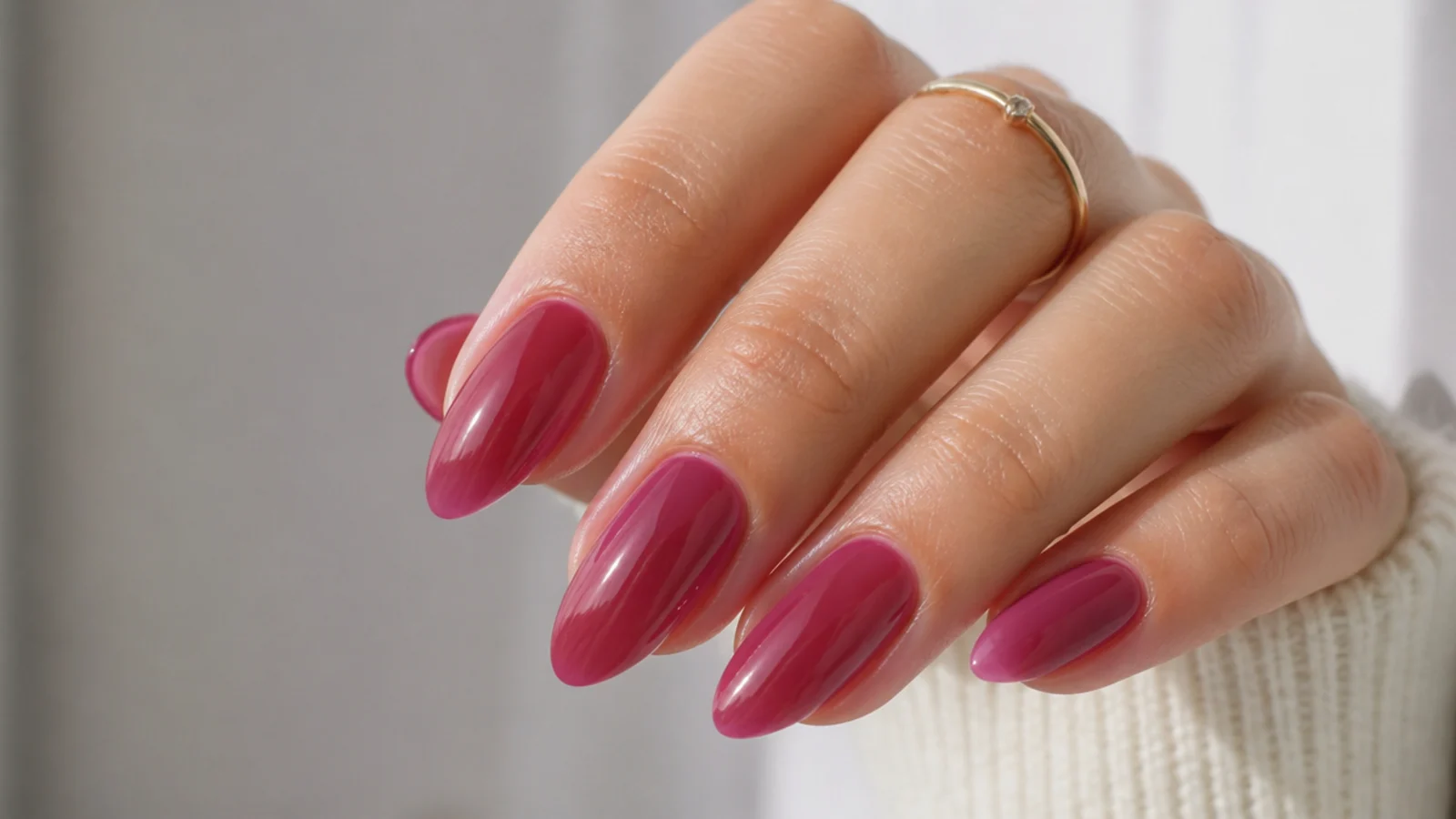 Milky sheer berry almond nails with a soft translucent wash