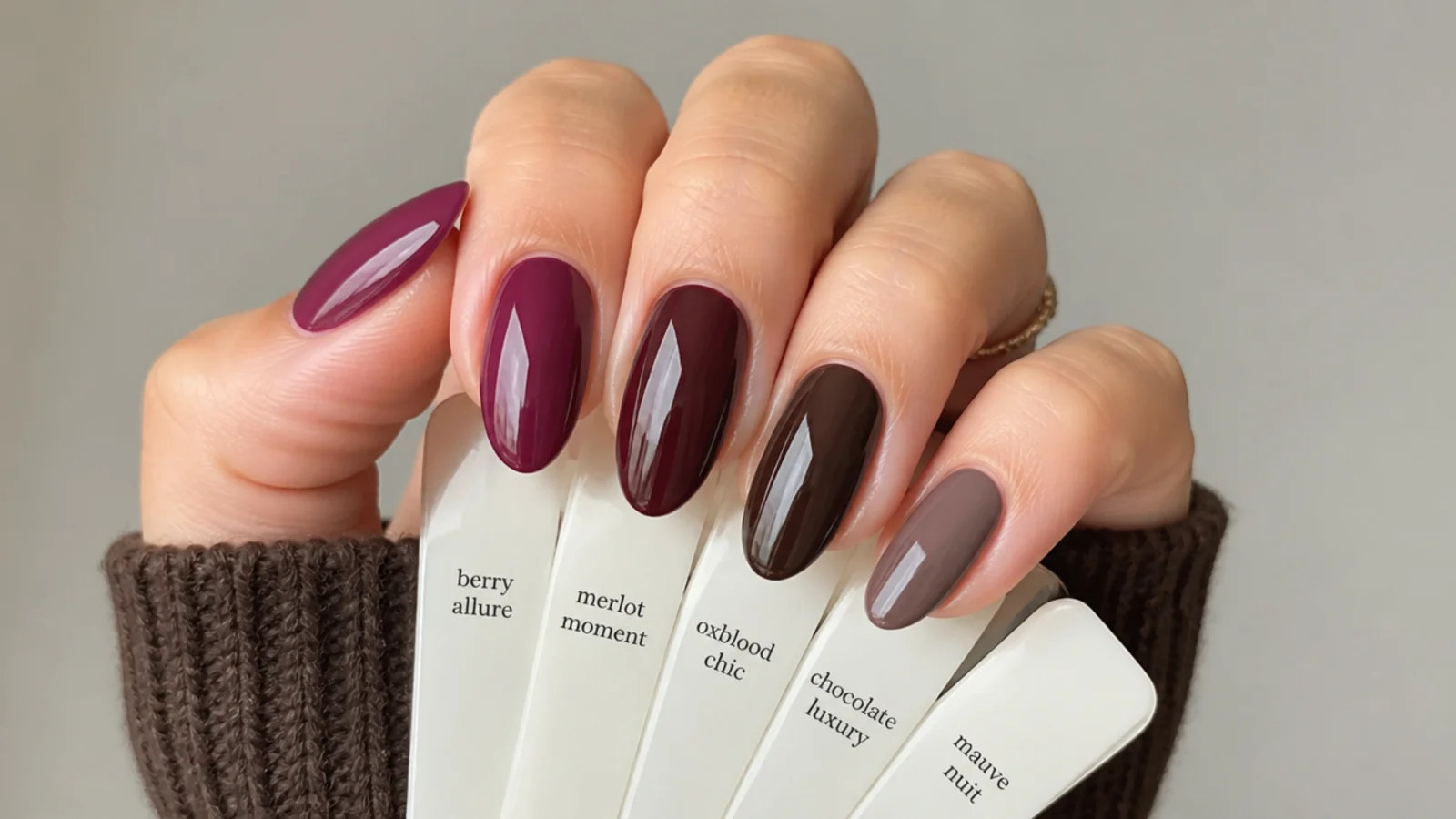 Swatches of berry, wine, oxblood, chocolate and mauve dark feminine polish