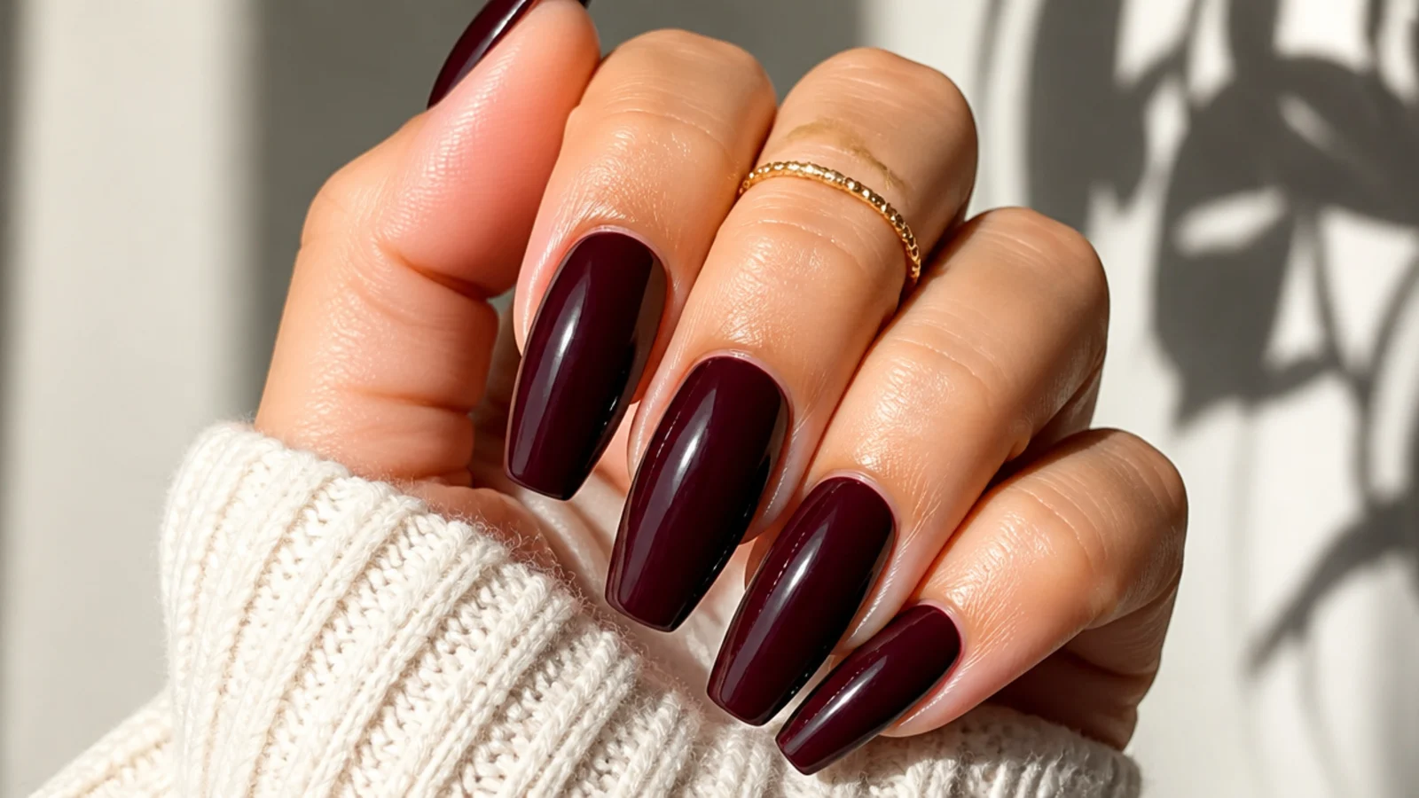 Deep blackberry wine coffin nails with a glossy finish