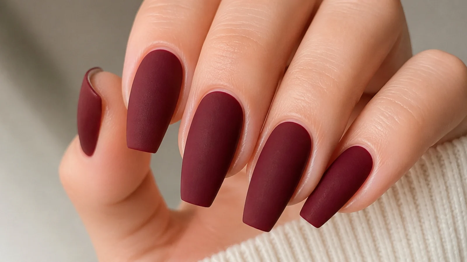 Deep wine coffin nails with a soft velvet matte finish