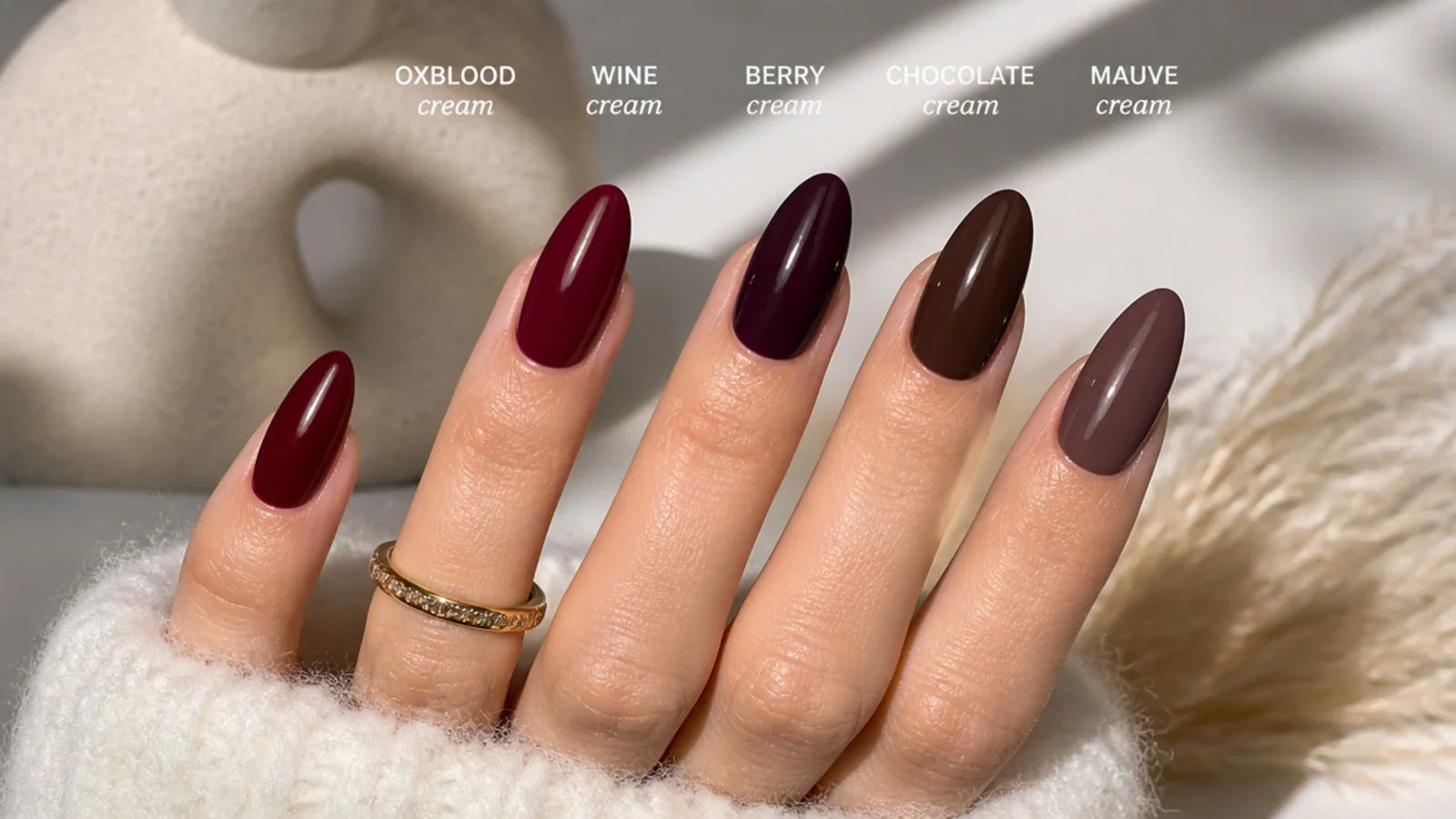 Swatches of oxblood, wine, berry, chocolate and mauve dark feminine shades