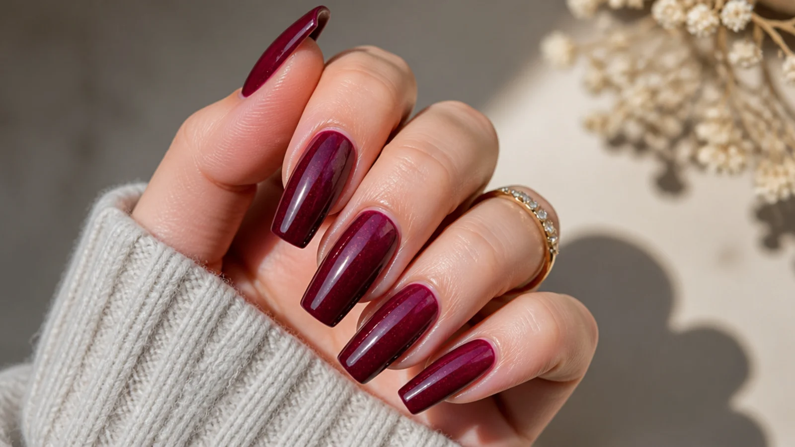 Glossy deep berry coffin nails with a high-shine glazed top coat