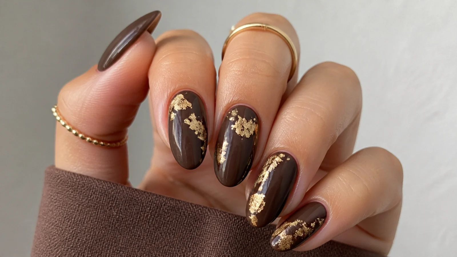 Chocolate brown dark feminine nails with torn gold foil accents