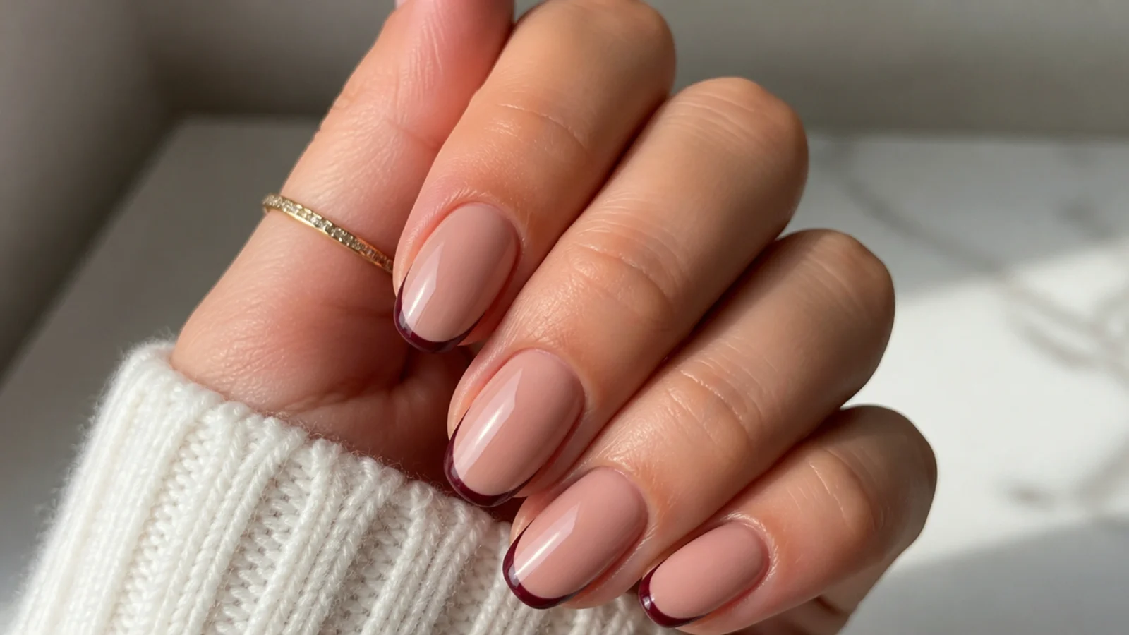 Micro-thin wine red French tip dark feminine nails on a sheer nude base