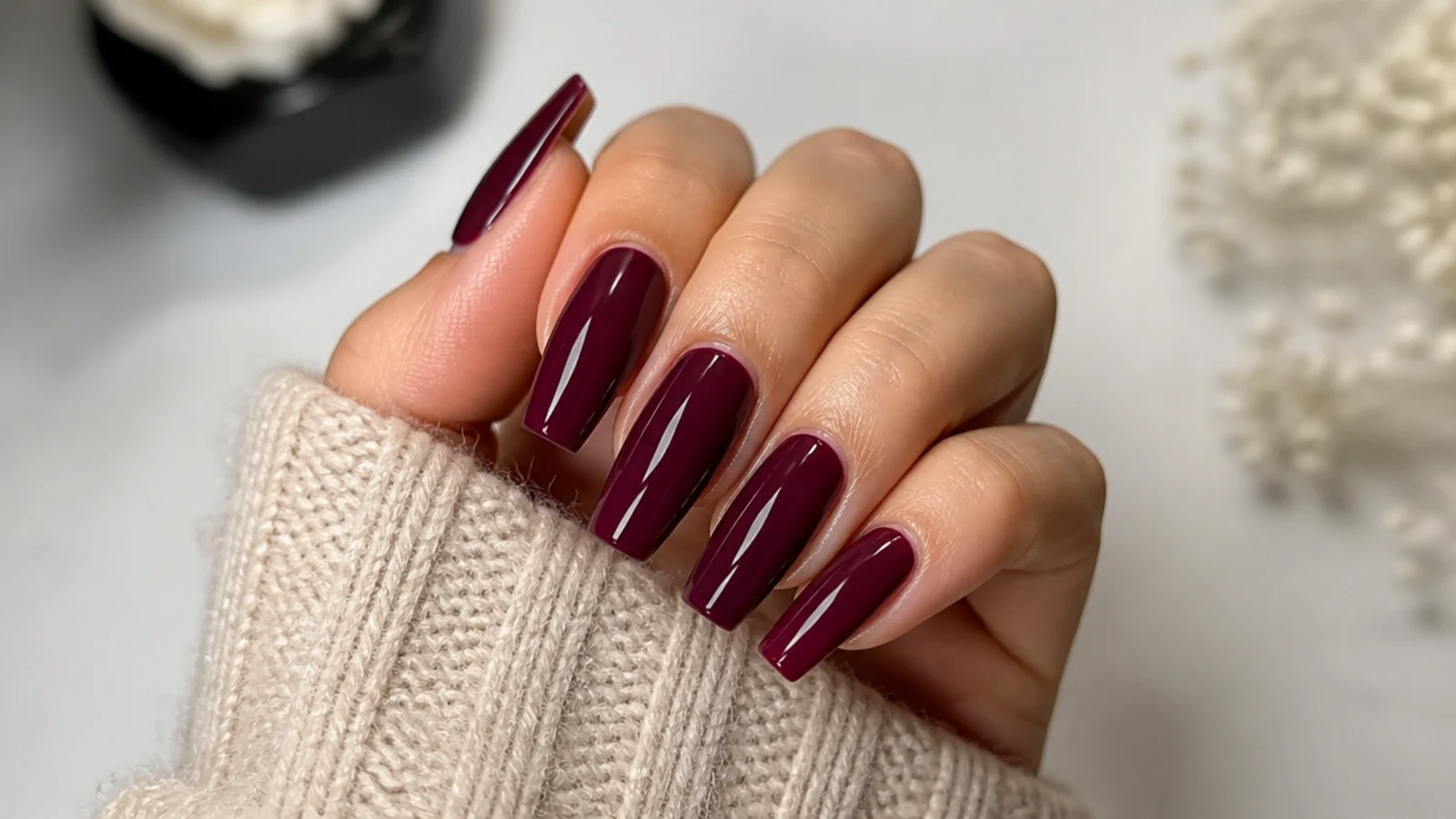 Deep wine red coffin nails with a glossy finish
