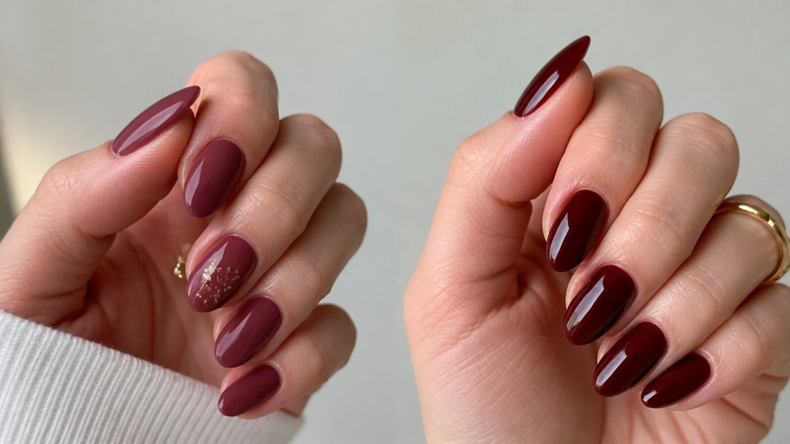 Short deep berry almond nails styled for the office beside a glossy oxblood set