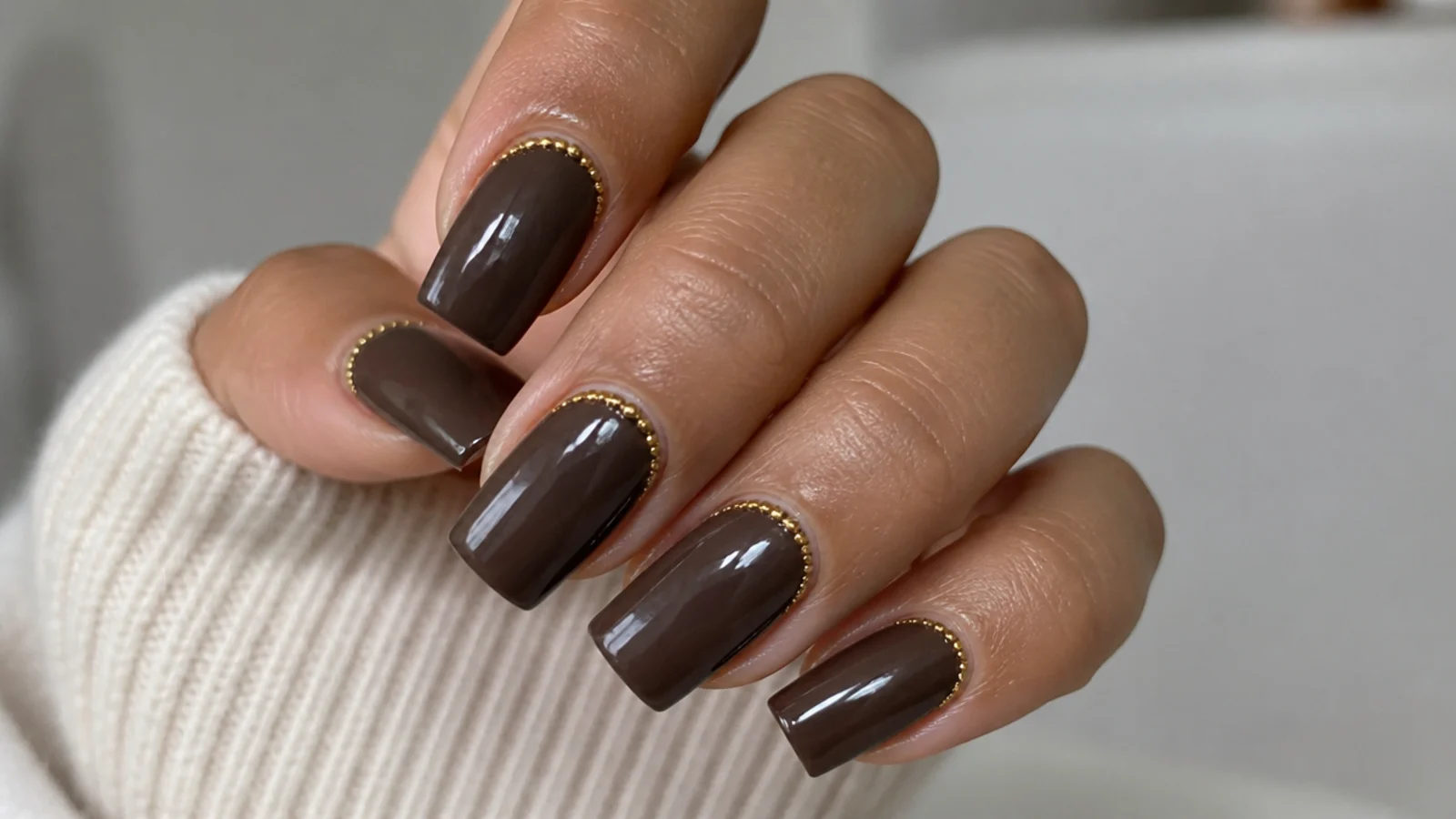 Chocolate brown square nails with tiny gold micro-bead cuticle detail