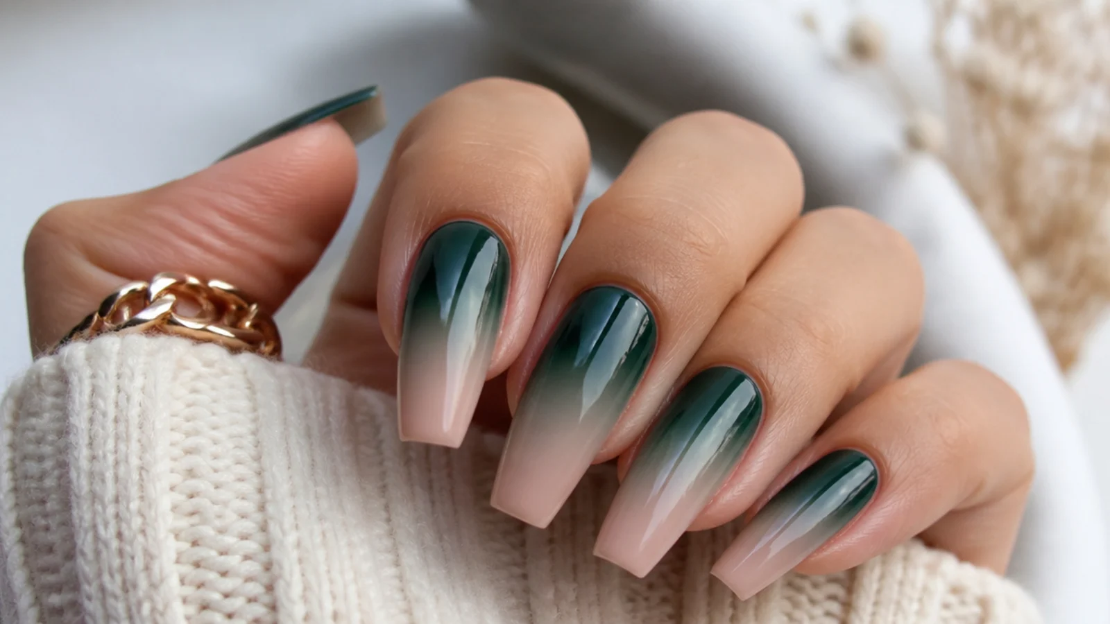 Dark forest green to nude ombre nails on a coffin shape