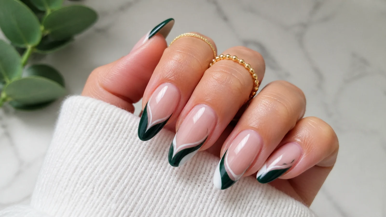 Dark green and white swirled french-style acrylic nails