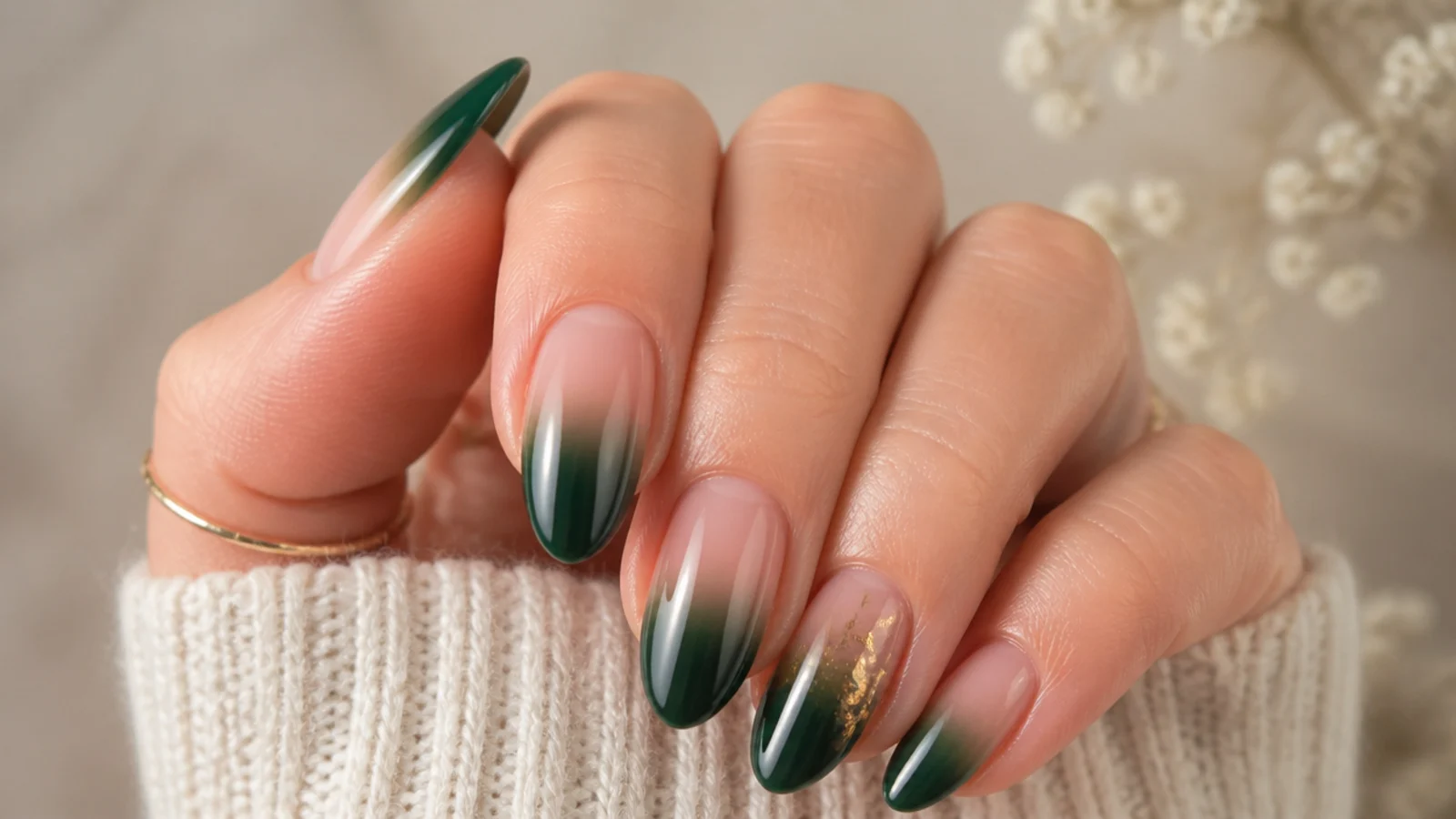 Dark emerald to nude ombre almond nails