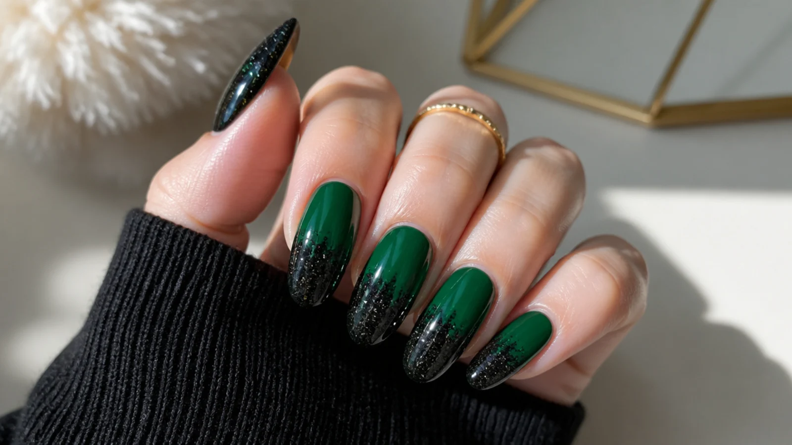 Emerald green nails with black glitter gradient tips