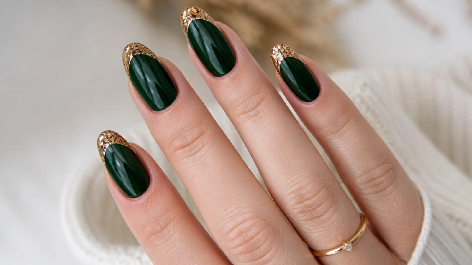 Forest green nails with chunky gold glitter french tips